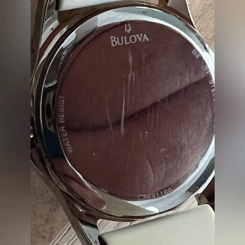 Caravelle by Bulova Ladies Watch White Silicone Bracelet White Dial Date Window - Picture 8 of 13